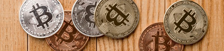 Apart from being a payment system, what are the other functions of cryptocurrencies?